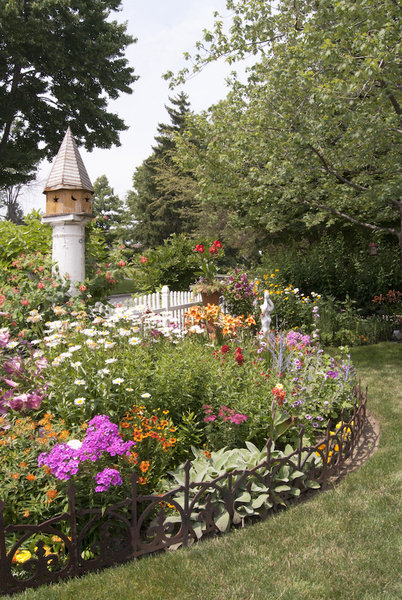 Punches of color bring this dreamy backyard landscape to life.