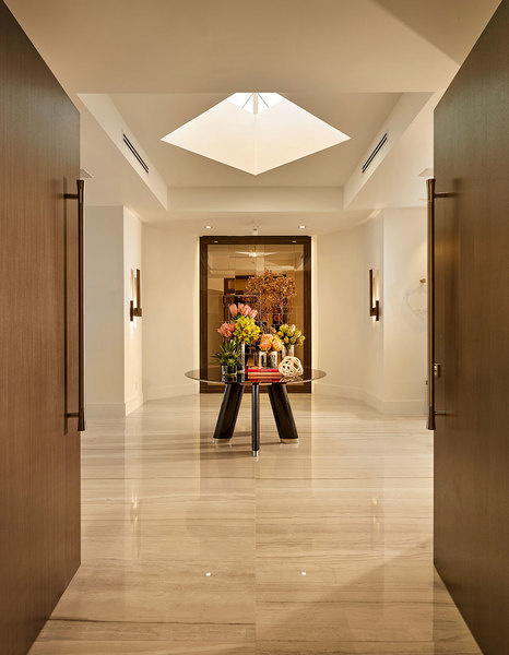 A staged foyer at the Naples penthouse perched on the top floor of the Seasons at Naples Cay, Florida